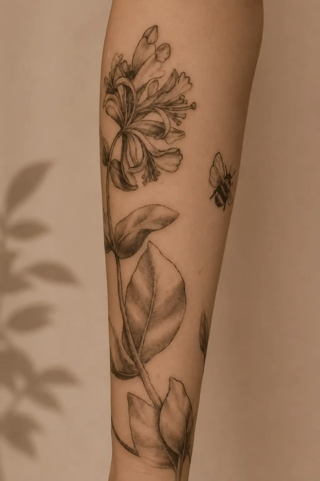 botanical arm tattoo by Kira